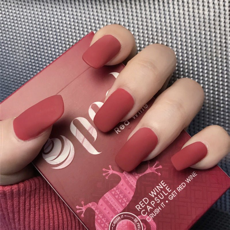 Finished Manicure with False Nails